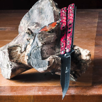 Складной нож бабочка Краcные черепа